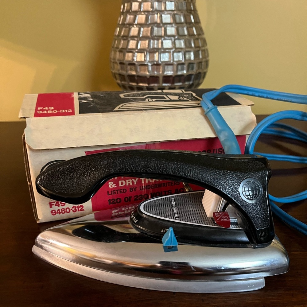 Vintage GE Black and Silver travel Iron around 1960’s. Domestic & Overseas use.
